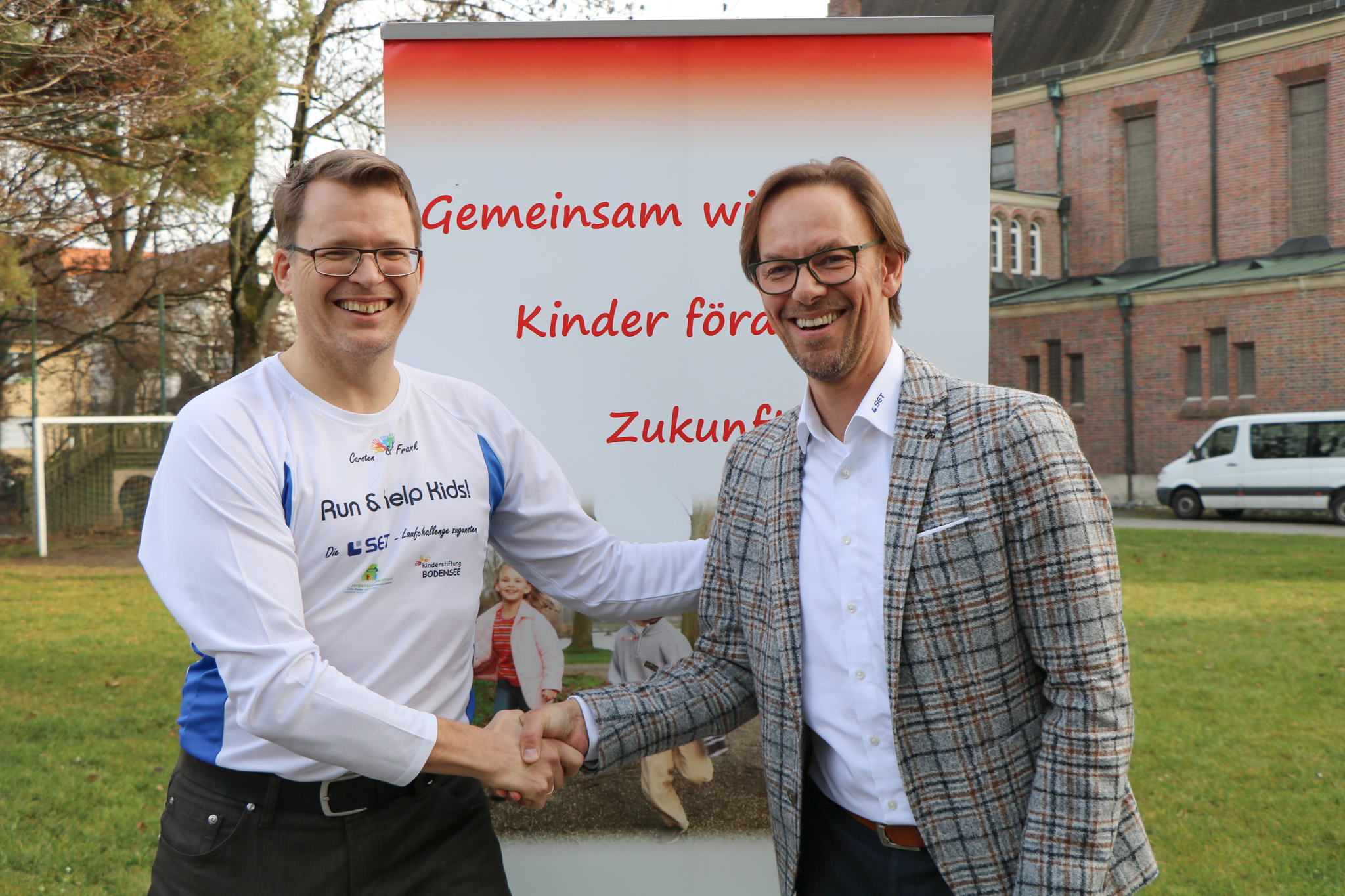 SET unterstützt Run And Help Kids: Foto mit Frank Heidemann und Carsten Sprung